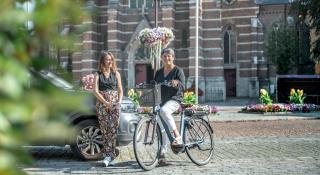 medewerkers op de fiets